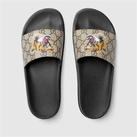 gucci tiger slides on feet|Gucci slide gg supreme tigers.